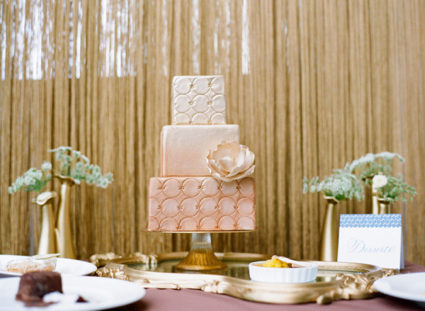 Elegant ombre cake with tented hand calligraphy dessert sign