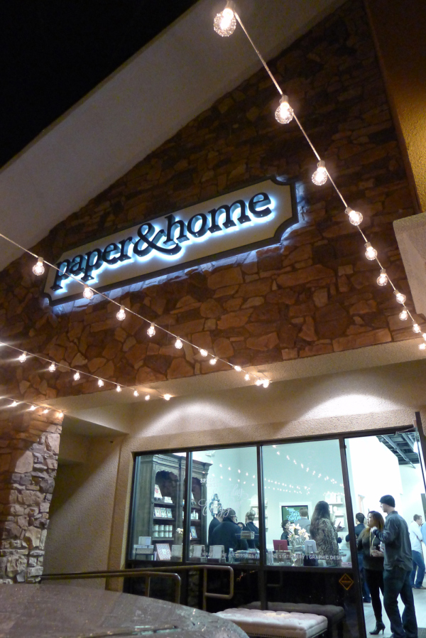 Paper and Home Storefront Sign with Bistro Lighting