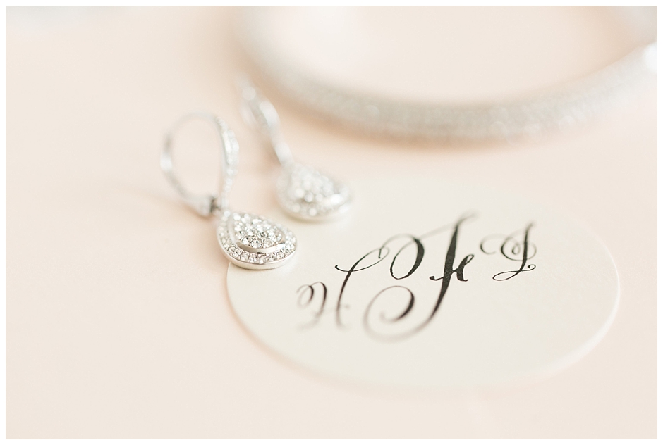 Classic wedding monogram invitation seal with bride's jewelry