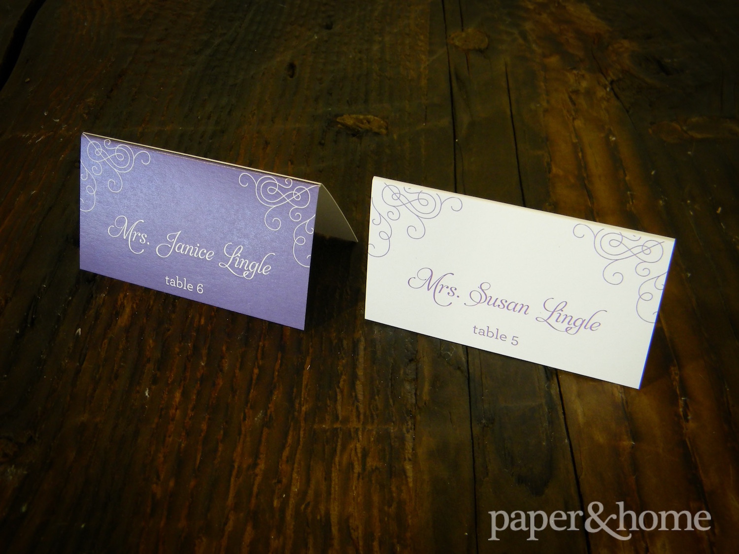 purple and white escort cards