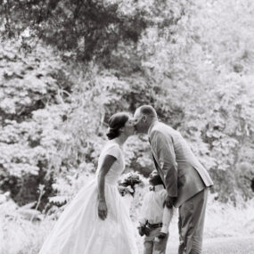 Husband, Wife, and Son on Wedding Day